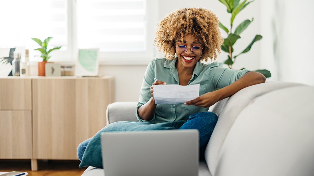 Business professional working comfortably in a furnished corporate apartment